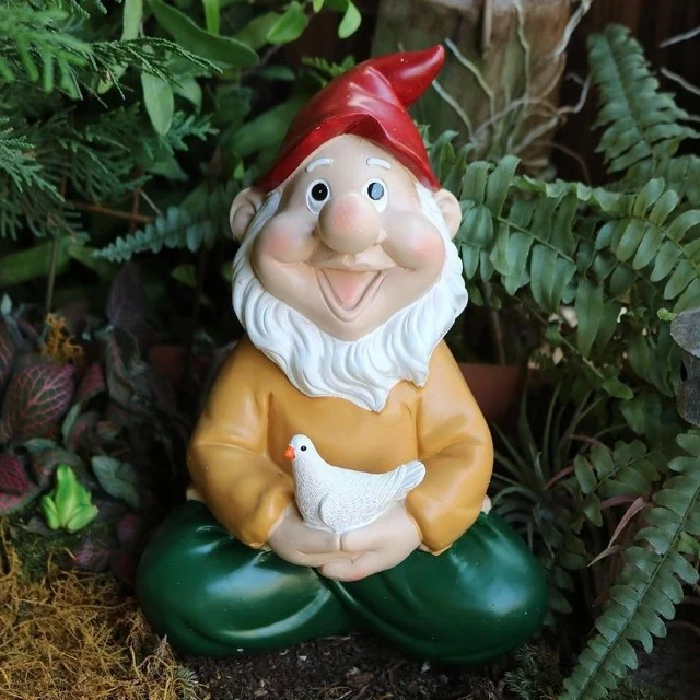 Nain de Jardin avec un Oiseau
