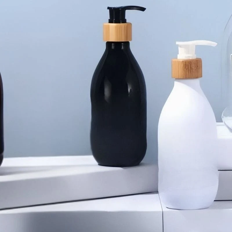 CleanFlow - Shampoo dispenser med genopfyldeligt design