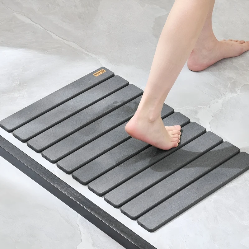 BathMate – Måtte med skridsikker belægning og foldbart design til indendørs brug