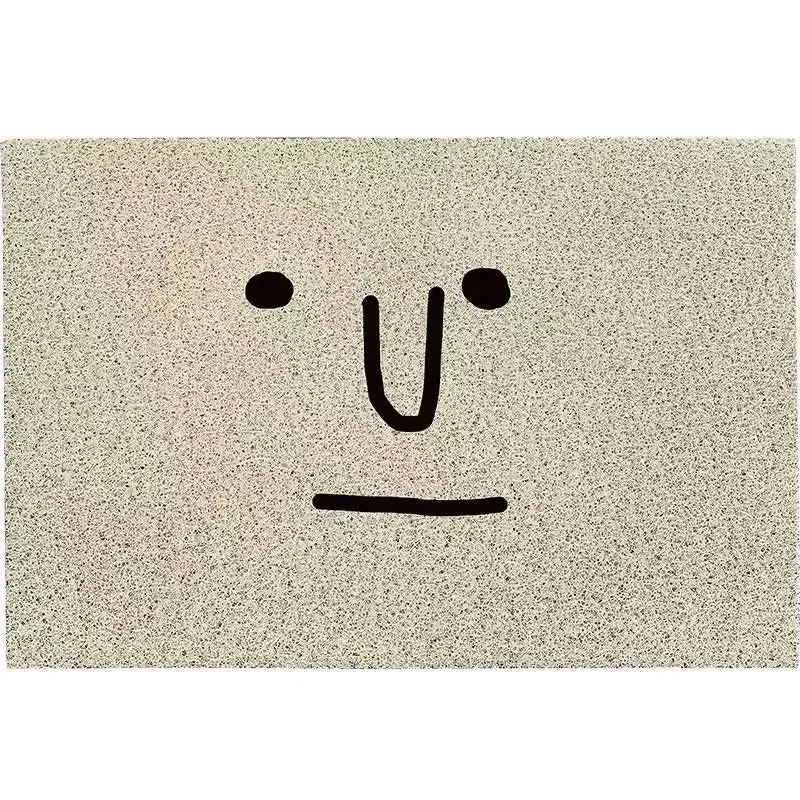 CheekyMat - Moderne dørmåtte med smiley design og skridsikker overflade