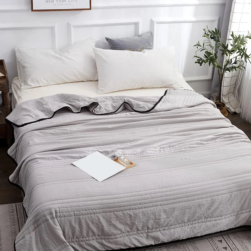 CozyWrap – Blødt tekstureret tæppe med kontraststrimler for komfort og stil