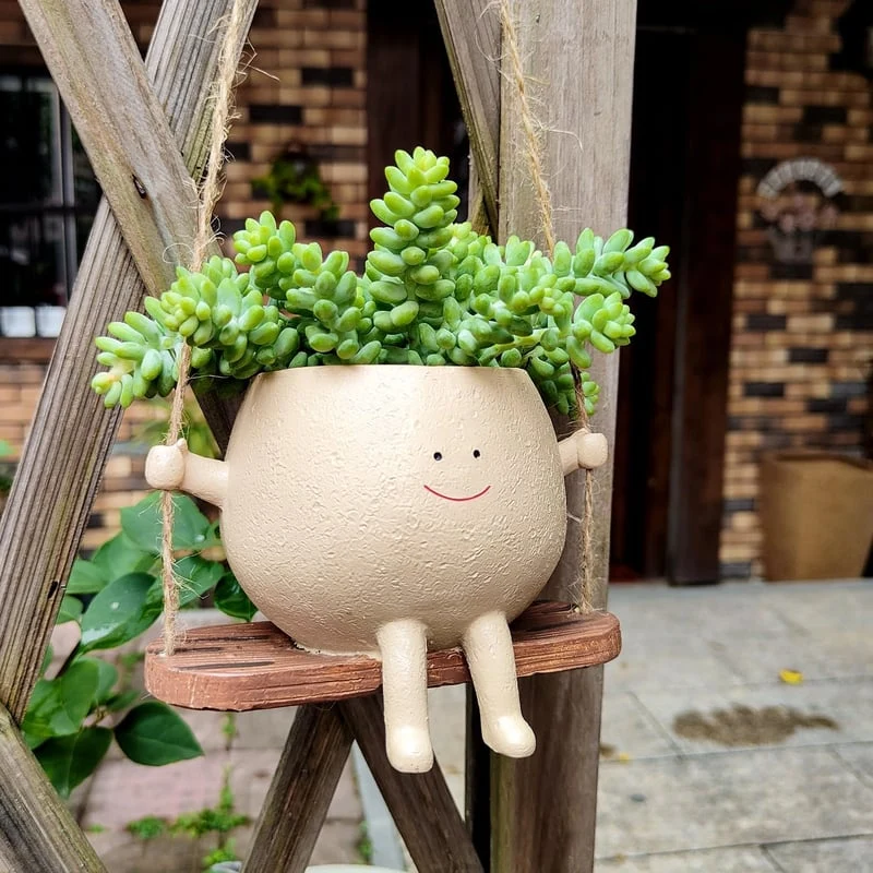 SwingJoy – Legefuld plantekrukke med gynge- eller gyngestolsdesign
