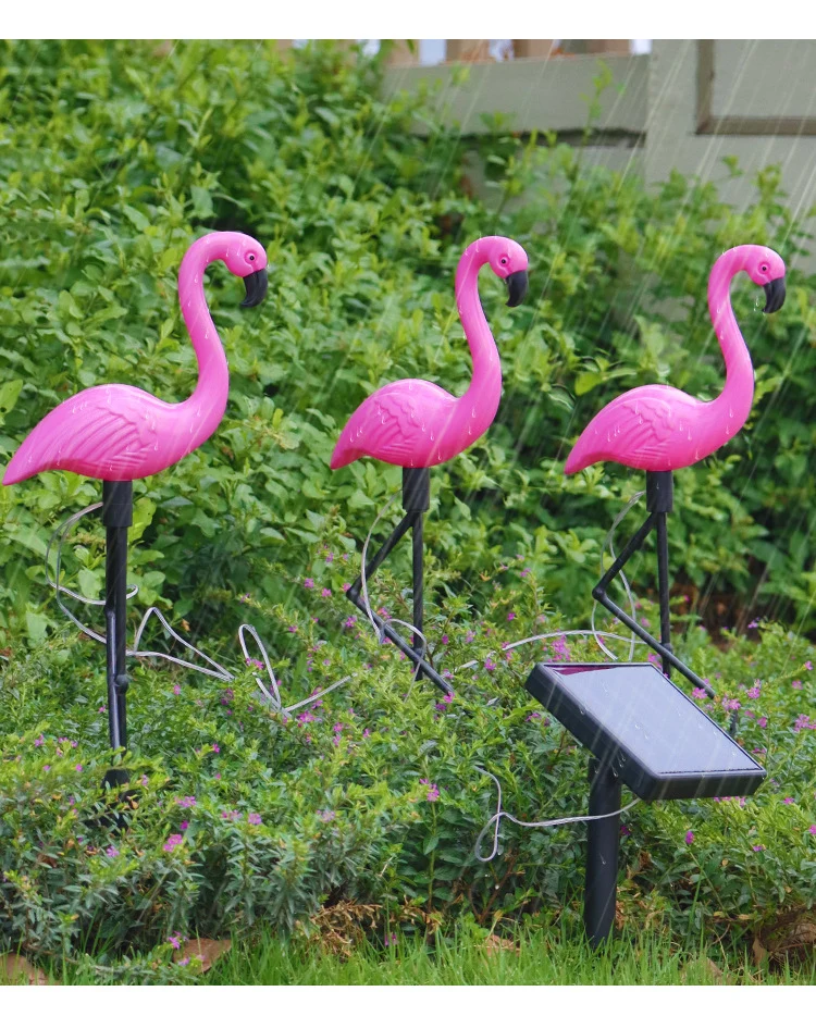SunFlare - Charmerende flamingo-solcellelampe
